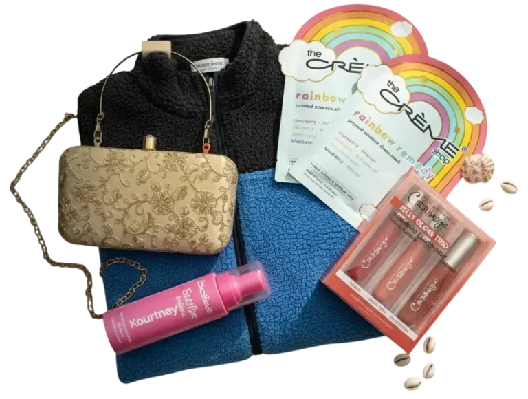 A bag of cosmetics, a stylish purse, and a wallet arranged together on a flat surface.